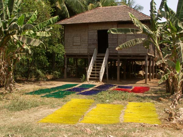 Drying dyed mat material