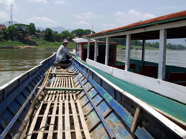 Ferrying our boat across the Mekong