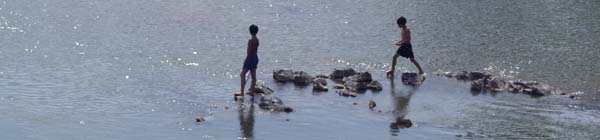 Kids playing in river