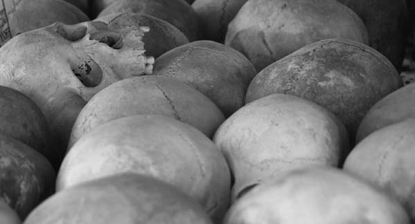 Black and white photograph of the skulls of Cambodians murdered by the Khmer Rouge