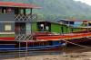 Colourful barges of the Mekong