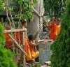 Monks making a Buddha statue