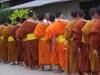 Monks receiving food for the day