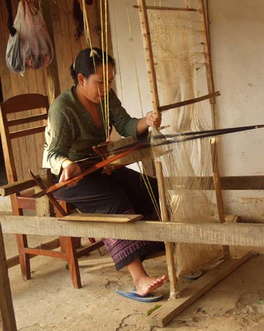Weaving her own clothes