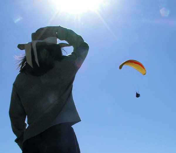 Nancy watching Casey paragliding