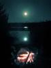 Campfire at moonrise