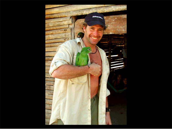 Marco with some of the village's parrots