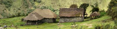 Local farmhouses with thatched roofs and stone walls