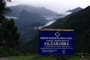 Vilcabamba archaeological park sign and Vilcabamba valley