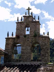 Church bell tower built with Incan roof pegs for decoration