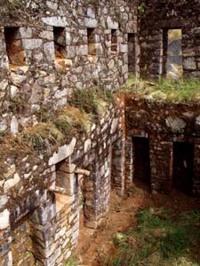 Looking down to the first floor of the front half of Inca Wasi from the second story